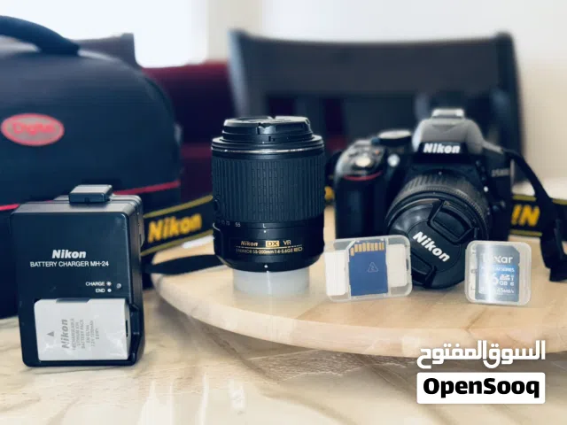 Nikon D5300 DSLR with 18-55 VR + 55-200 VR lens.