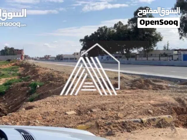 قطعة ارض ( حوزة ) للبيع علي الطريق مباشرةً نهاية طريق عين زارة قبل سيمافروا وادي الربيع
