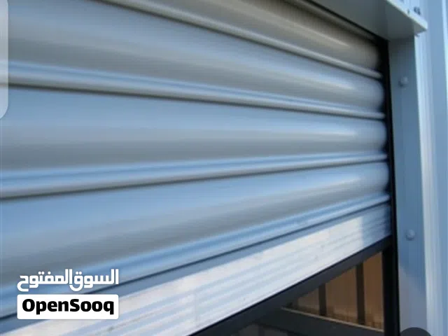 حداد صيانة وتفصيل أبواب المخازن كهرباء وعادي