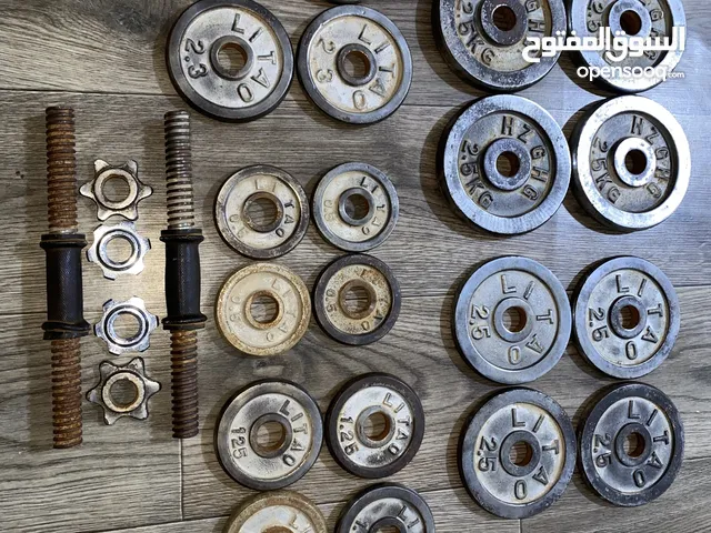 اثقال حديد جديده مع جميع الاوزان + دمبلص عدد 2 + بار عدد 1