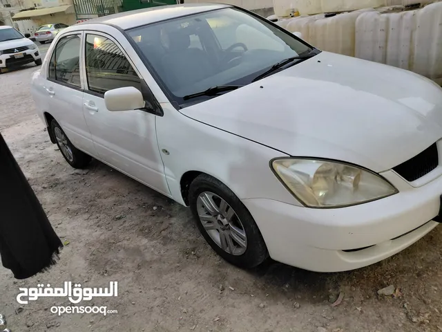 We are sale Mitsubishi lancer model 2010 passing insurance next year may engine gear Ac100 ok if any