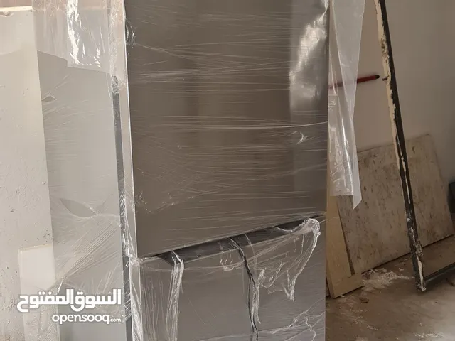 ثلاجة مع فريزر نوع نيوتن صناعه 2024