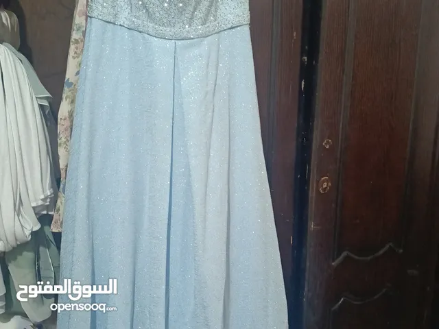 فستان سهرة لون ازرق فاتح