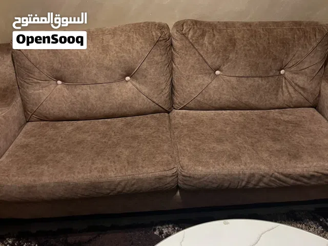 طقم كنب بني سبع مقاعد