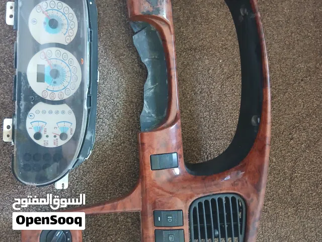 عداد كيا سبيكترا رياضي مع غطاء فرمايكا