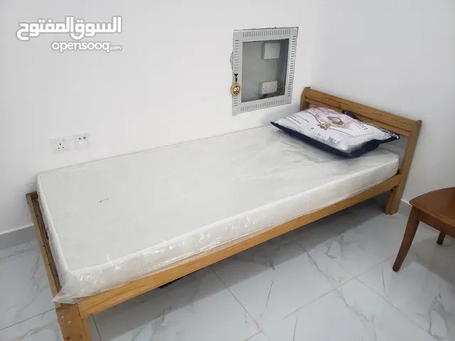 wooden bed with accessories