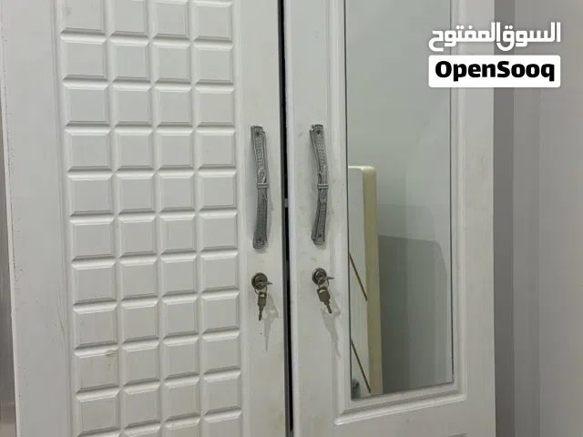 bed and cupboard