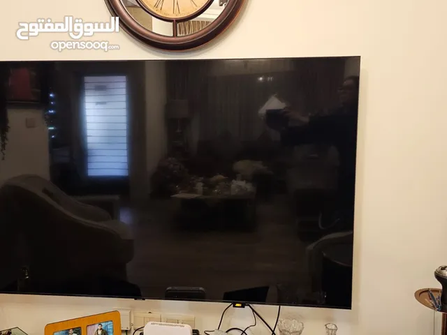 تلفزيون شاشه 75 مع طاولة التلفزيون ب 1000