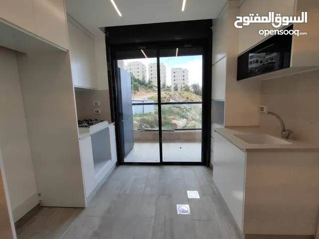 شقه فارغة للايجار في ضاحية الريحان قرب لاكاسا مول