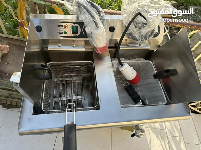 قلاية كهربائية مزدوجة ستانلس ستيل مع حنفيات لتصفية الزيت – بسعر 2000 شيكل