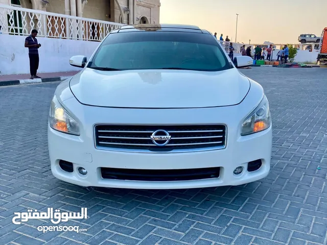 Nissan Maxima 2009 USA نيسان مكسيما 2009 فل كامل فتحه بنوراما رقم 1 لون ابيض غرفه عسلي  سعر 15000