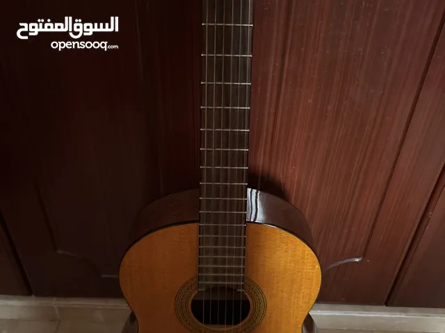 تعليم عزف جيتار كلاسيك وغناء عربي