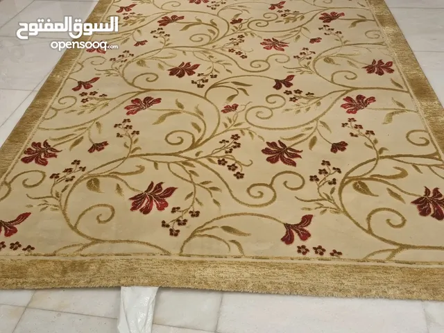 New flowery carpet in red leaves golden branches
