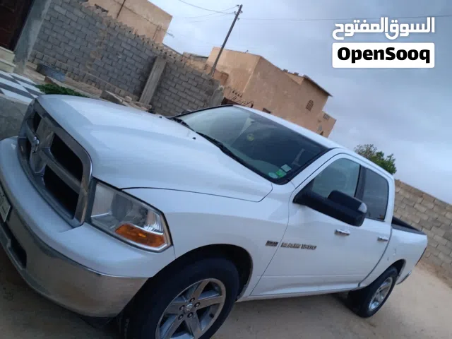 دودج رام 1500  سيارة تبارك الله اللون ابيض دفع روباعي ماشية210الف ميل اسيرادامريكي