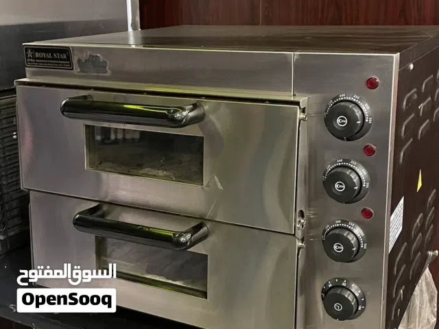 فرن كهربائي مستخدم نظيف