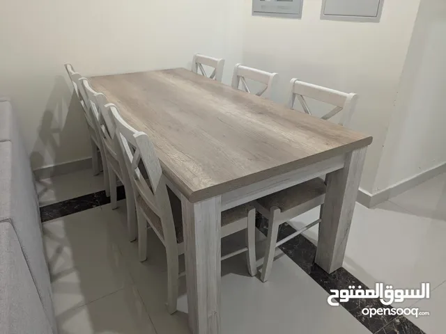 6 - Seater Dining Table with chairs. No scratches or damage.