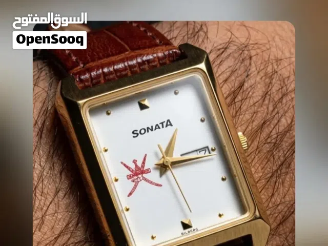 SONATA watch from TITAN Company شكل التانك مع شعار السلطنة سيفين وخنجر تاريخ مع اليوم