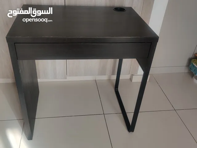 black table with a simple drawer