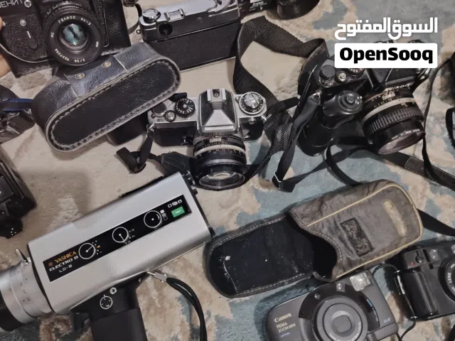 كاميرات قديمه كلاسيك نظيفه كانون و نيكون و زينت.. الخ