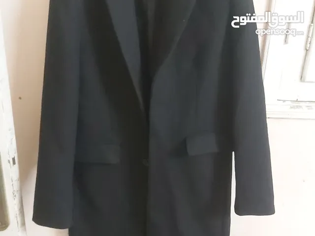 بالطو من ديفاكتو