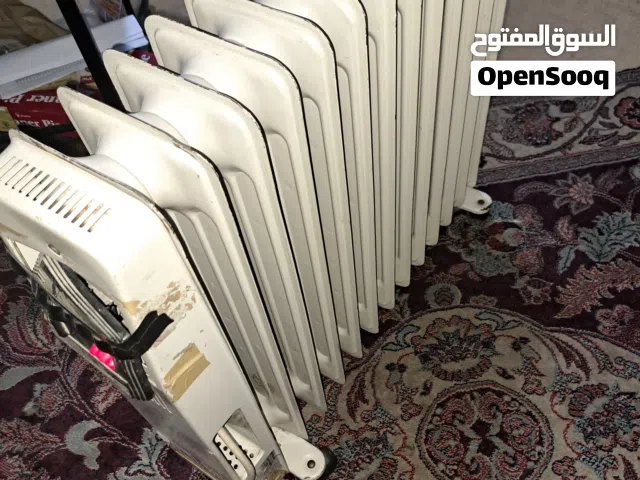 دفاية كهربائي وسخان طعام