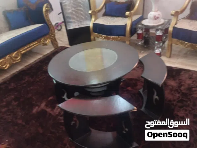 طاوله وسط خشب وزجاج