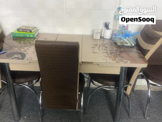 ميز سفرة زجاج، مع 4 كراسي