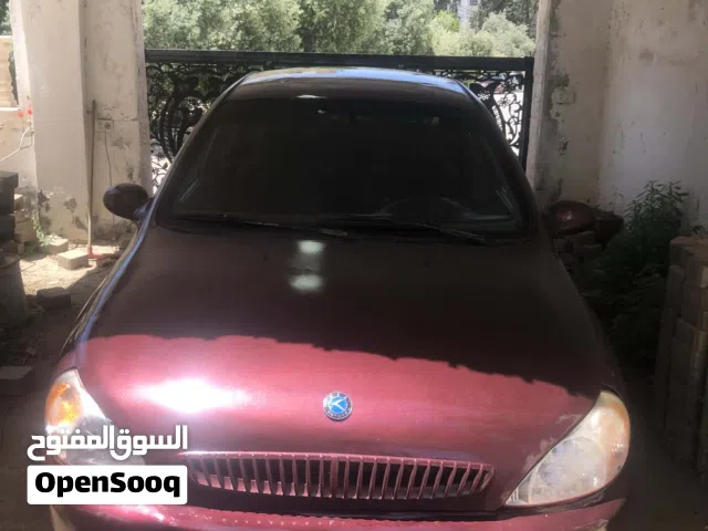 2002 كيا ريو Standard