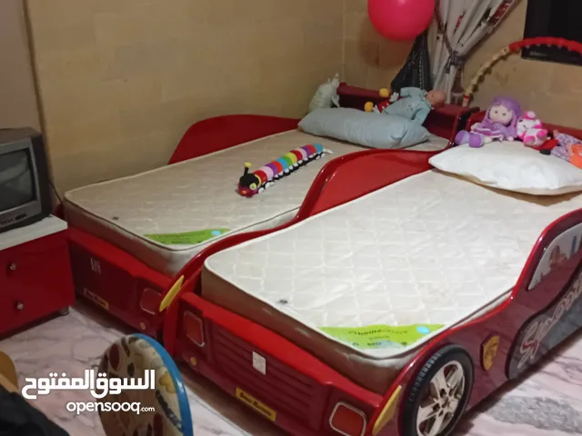 ferrarri furniture's 2 beds 2 desk for babyroom used like new  with mattress