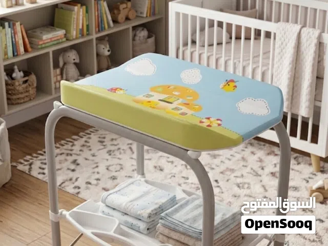 طاولة غيار أطفال مع بانيو