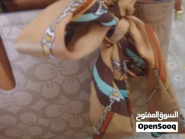 شنط يد للصيف بلون البني السعر حريق تلحق ما تحلق اخر قطعه الرقم تواصل بلوصف