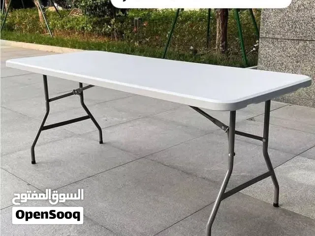 طاولة للعزايم وسفره و مزارع بتنطوا ع شكل شنته