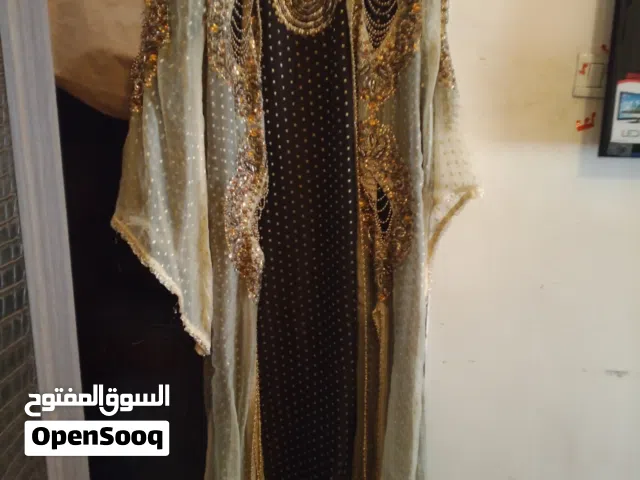 فستان سواريه طويله للمحجبات مشغول بالكامل