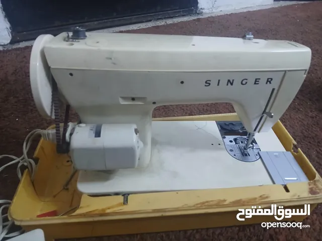 ماكينة خياطة سنجر منزلي
