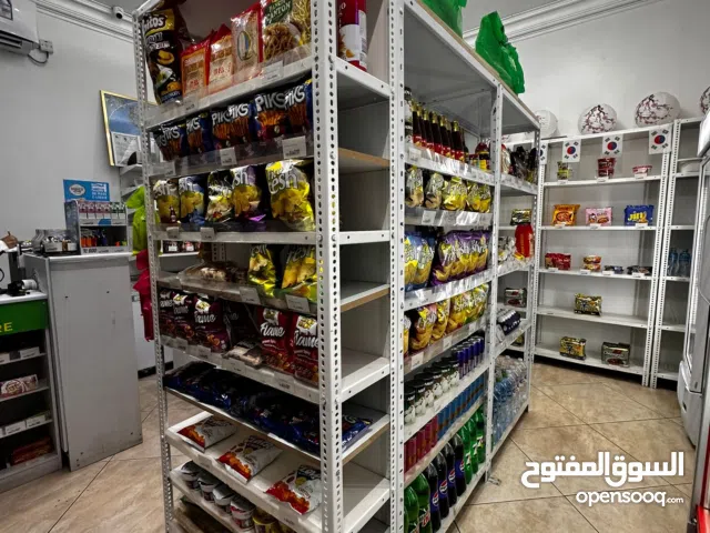 Along the road  Grocery  store near bus stop at Salmiya Al Mughera.