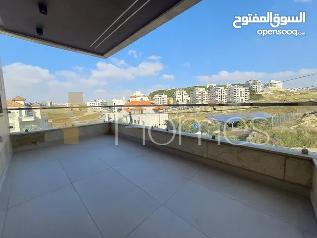 شقة ارضية للبيع في رجم عميش بمساحة بناء 180م