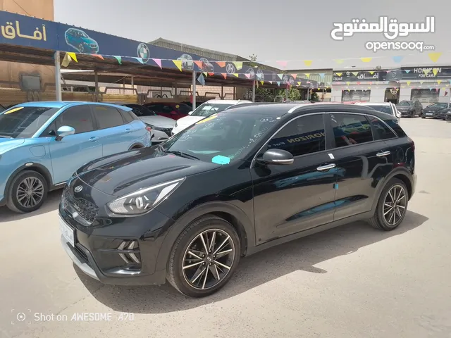 كيا نيرو هايبرد 2021 فحص 7جيد لون اسود مميزه للبيع مجمرك أو بدون جمرك للإعفاءات من المستورد مباشره