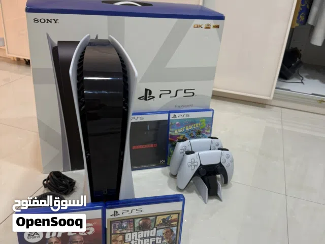 Ps5 with 2 controllers and 4 games and box