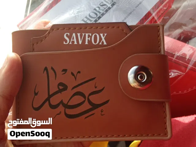 محفظه رجالي علها الاسم