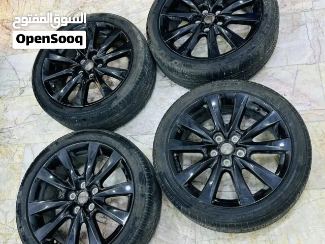 ويل مازدا قياس 18 طقم لون اسود لامع   مع تايرات ماركت  Toyo بحالة جيدة وجاهزة للتركيب