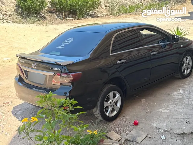 Toyota Corolla 2011 بحاله ممتازه عفشه جديده وراشه نضافه برا