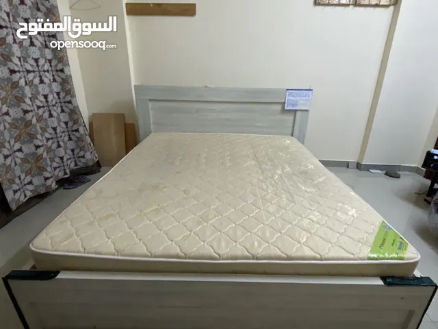 King size bed with medical mattress