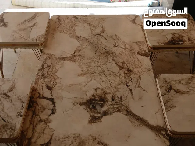 طاوله كبيره معا 4 صغار مطلوب فيها 15