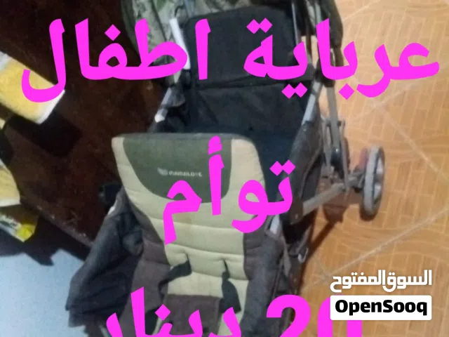 عرباية اطفال توائم بحالة ممتازة