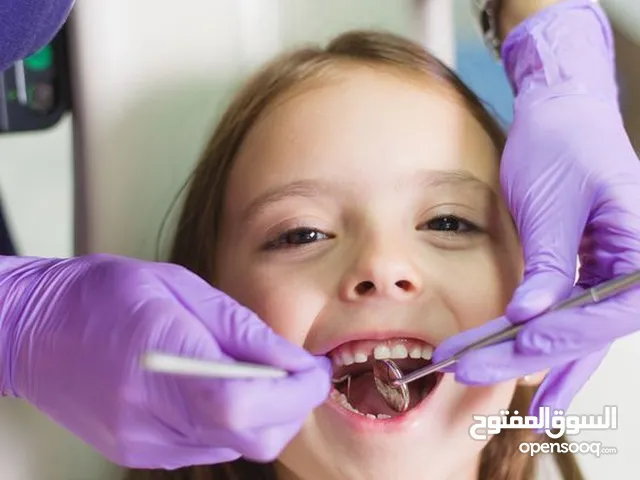 علاج اسنان مجانا في كربلاء