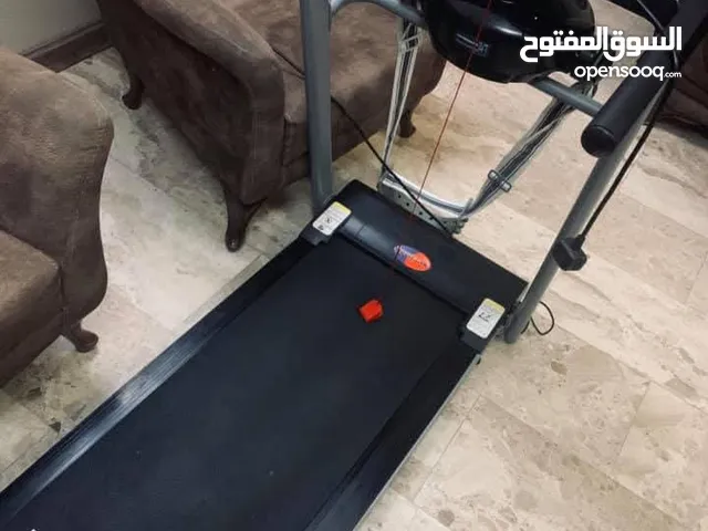 جهاز جري كهربائي أو جهاز مشي