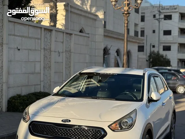 كيا نيرو وارد كوري للبيع السيارة بحالة الوكاله فحص كامل وفل كامل عدا فتحه