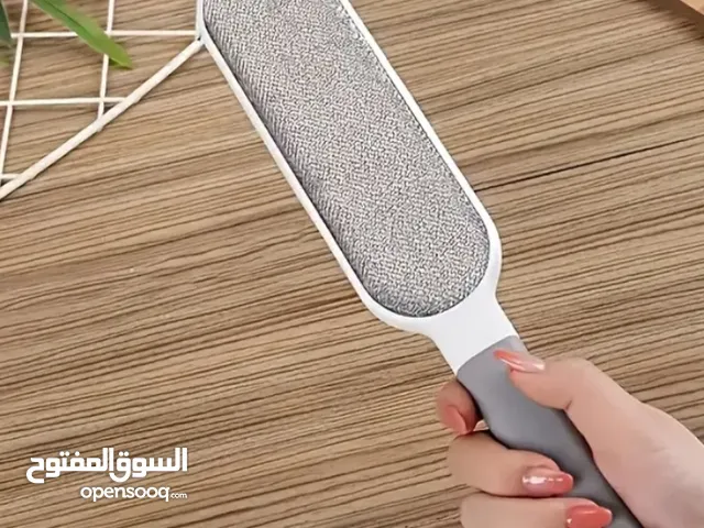 فرشاة إزالة الشعر للقطط أو الملابس