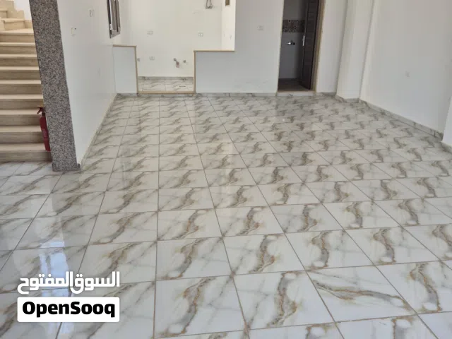 مبنى جديد إداري - تجاري للإيجار متفرع من شارع ميزران