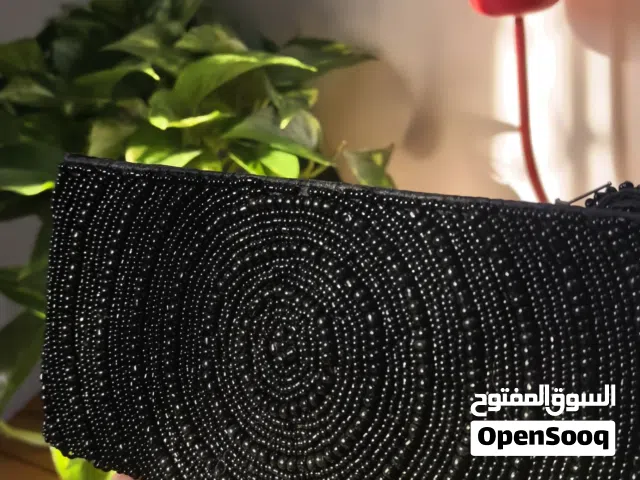 Handmade black purse from Bali 10dhs